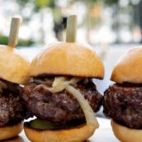 Mini Burger Sliders (3) · House-ground beef blend patty grilled onion, pickle, homemade BBQ sauce.