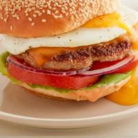 Egg Burger · Includes lettuce, tomato, grilled onions, fried egg and house dressing.
