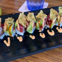 Haiku Roll · Spicy tuna, topped w/ Hamachi, avocado, tempura jalapeno, unagi sauce, spicy mayo & onion.