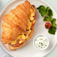 Criss Croissant  · Scrambled egg, and cheddar cheese served on a croissant.