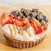 Blended Açai Bowl · Base: acai berry, almond milk, banana. Toppings: strawberry, blueberry, banana, granola, chi...