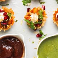 Bhel In Phyllo Cups · Spiced crispy rice & lentil flour savories served in pastry cups.