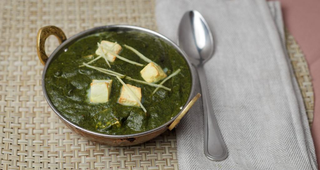 Saag Paneer · Puree of spinach cooked with homemade cottage cheese.