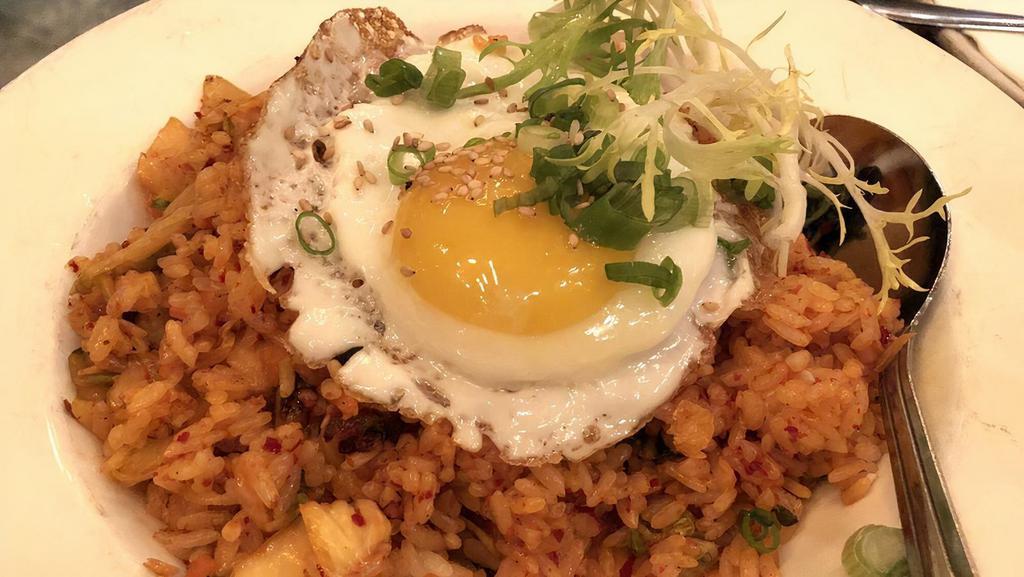 Kimchi Fried Rice · Spicy. Sunnyside egg, stir-fried rice, assorted vegetables and kimchi, and (bacon or chicken).