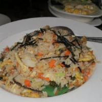 Seafood Fried Rice · Gluten-free. Korean style pan-fried vegetables, scrambled egg, stir- fried rice, and seafood...