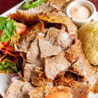 Gyro · Doner. Ground meat marinated in its own juice and cooked on a rotating skewer. Shaved in thi...