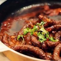 Sausage Iskandrany · Alexandrian-style beef sausage cooked in a special sauce.