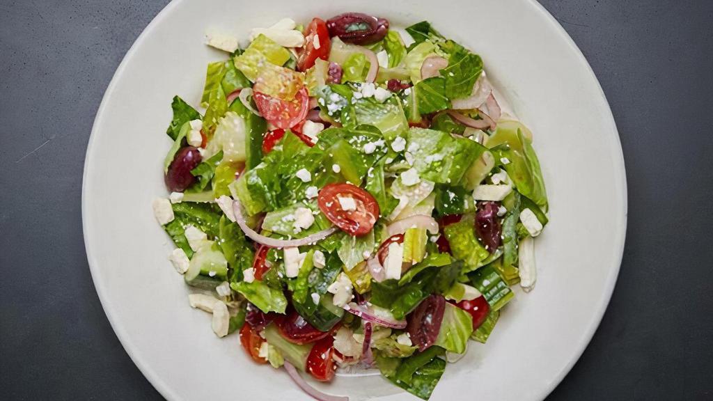 Greek Salad · Romaine lettuce, kalamata olives, feta cheese, cucumbers, bell peppers, sweet red onions, tomatoes with olive oil and white balsamic vinegar