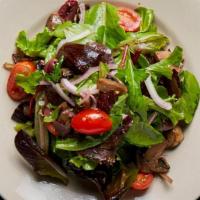 House Salad · Mixed greens, sweet red onions, kalamata olives, button mushrooms, and tomatoes with a garli...