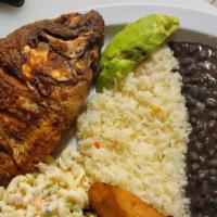 Mojarra Frita / Fried Porgy · Mojarra frita, arroz, frijoles, aguacate y platano maduro / Fried mojarra, rice, beans, avoc...