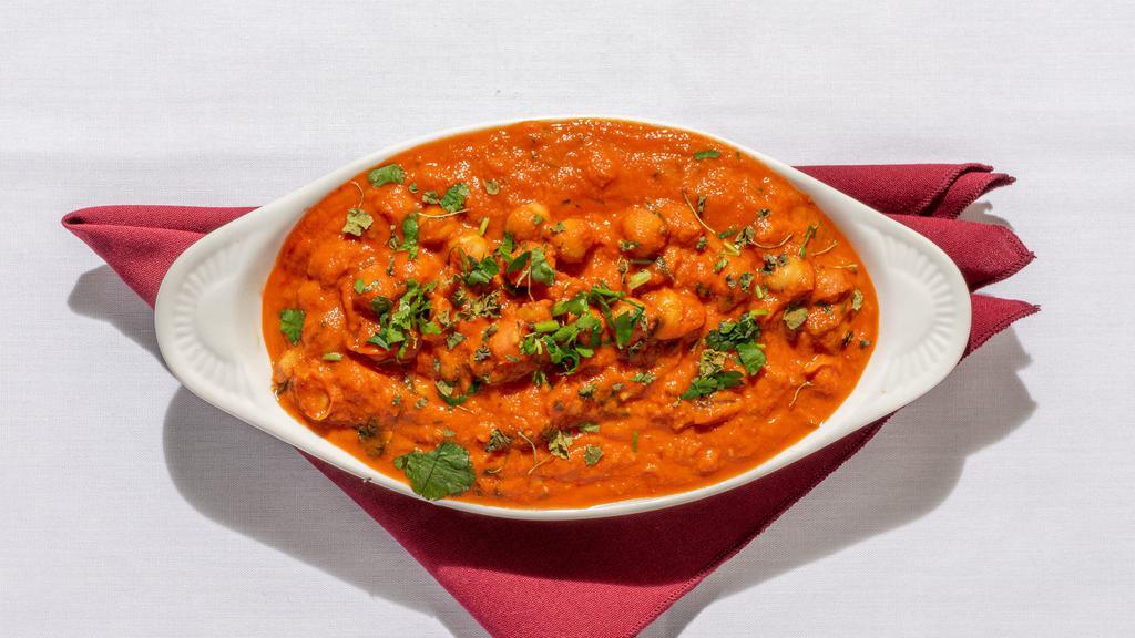 Chana Masala · Chickpeas, fresh tomatoes, potatoes cooked in a tangy dry sauce.