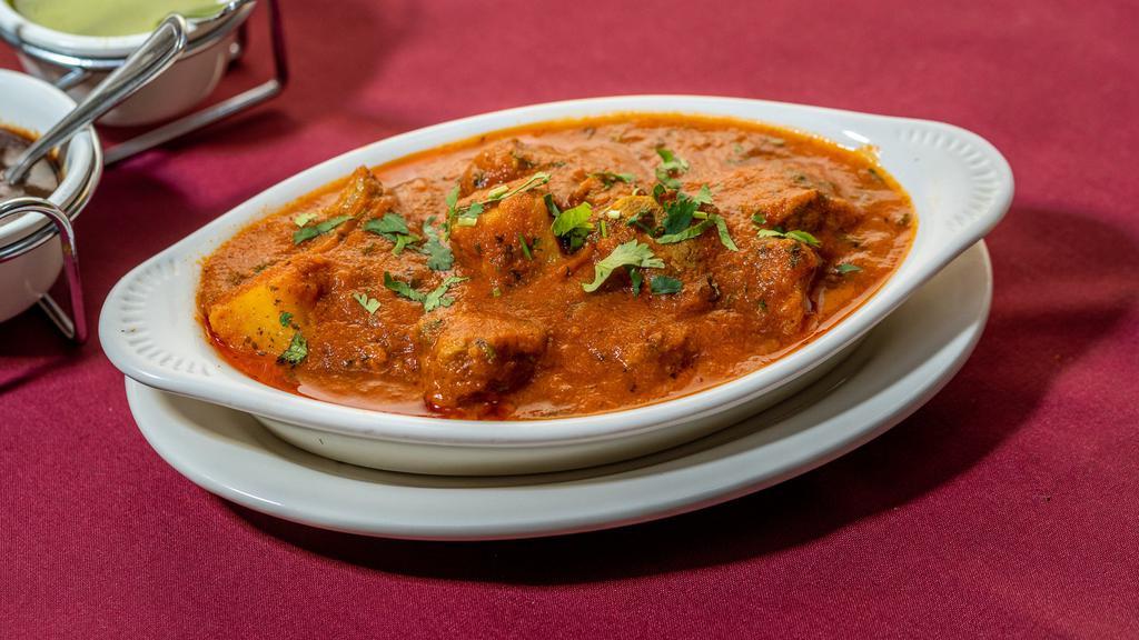 Lamb Vindaloo · Fresh Lamb pieces cooked with potato and Indian spices.
