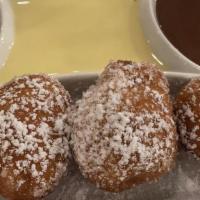 Beignets · French style donuts made to order, filled with raspberry jam, accompanied by crème anglaise,...