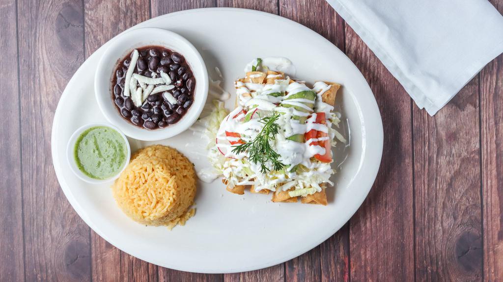 Flautas · Traditional Mexican Taquitos! Three crisp corn tortillas, filled with your choice of chicken or shredded beef and topped with sour cream, guacamole, and mild salsa.