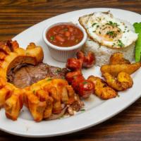 Bandeja Paisa · Colombian dish with rice, red beans, steak, sausage, fried pork, sweet plantain, arepa, egg,...