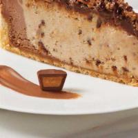 Reese’S® Peanut Butter Chocolate Cheesecake  · Reese's® Peanut Butter Cups combined with a rich chocolate cheesecake topped with chopped Re...