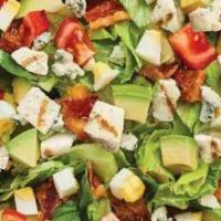 Avocado Cobb Salad · Fresh Avocado enhances this timeless classic! Served with Grilled Chicken, Chopped Tomatoes,...