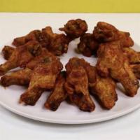 Shaq'S Big Chicken Hot Wings · Shaquille O'Neal's signature wings are crispy and coated in a Nashville style hot sauce. 7 p...