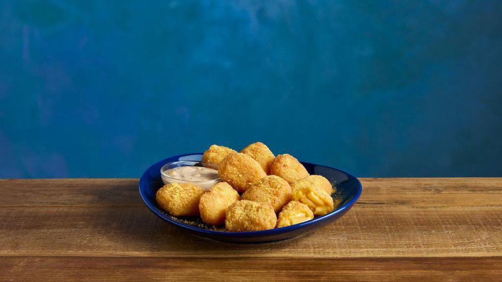 Bbq Fried Kraft® Mac & Cheese Bombs! · KRAFT Mac & Cheese Bites with a shake of cayenne cheese dust, served with Bomb Sauce (KRAFT Blue Cheese Dressing and BULLS-EYE® BBQ Sauce)