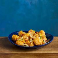 Loaded Kraft® Mac & Cheese Bites · KRAFT Mac & Cheese Bites topped with bacon pieces, shredded cheddar cheese, crispy onions, a...
