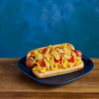 Kraft® Mac & Cheese Dog · Toasted bun stuffed with an all-beef hot dog and topped with KRAFT Mac & Cheese,  HEINZ® Ket...