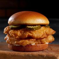 Southern Chicken Sandwich · Two, 4 oz deep-fried chicken breasts, crunchy pickle chips, and mayonnaise on a potato brioc...