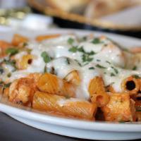 Rigatoni Fiorentina · Rigatoni tossed with fresh chicken pieces and spinach, sautéed in a creamy pink sauce, with ...