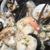 Pescatore · Clams, calamari, shrimp, and mussels in a red or white sauce with your choice of marinara, f...