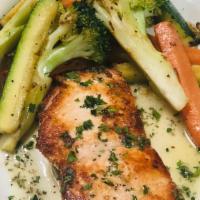 Salmon · Served w mixed vegetables in a lemon butter sauce or  w a side salad or your choice of pasta