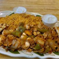Chicken Gyro Platter · Served over rice with fried onions, green peppers and bread.
