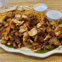 Mix Gyro Platter · Served over rice with fried onions, green peppers and bread.