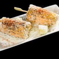 Mexican Street Corn · corn off the cob, chipotle aioli, cotija cheese, lime, tajin