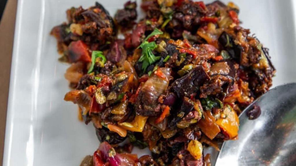 Caponata · Sweet-and-savory Sicilian eggplant relish with red and yellow peppers, onions, olives, capers, celery & herbs.