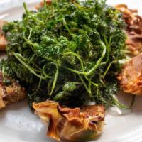 Carciofi Fritti · Fried artichokes with crispy parsley.