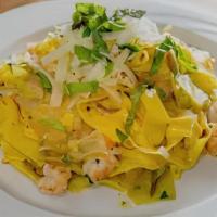 Tagliatelle Con Gamberi Verza E Pecorino · Egg noodles with shrimps, cabbage and sheep’s cheese.