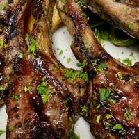 Rack Of Lamb · Australian rack of lamb marinated with thyme rosemary, olive oil & sea salt seared served wi...