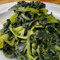 Spinaci Saltati · Side of sauteed spinach.