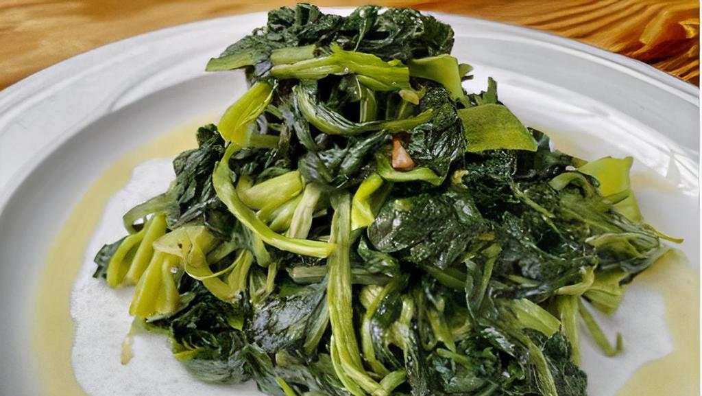 Spinaci Saltati · Side of sauteed spinach.