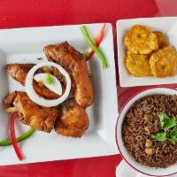Poulet Frit (Fried Chicken) · Elza's homemade succulent pieces of chicken  fried and served with Elza's  homemade creole s...