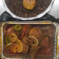 Stewed Turkey · Turkey stewed in homemade sizzling créole sauce. served with either white rice, rice and bea...