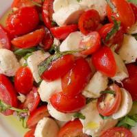 Tomato & Mozzarella · Fresh mozzarella, tomatoes, olive oil, and basil.