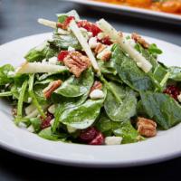 Spinach Salad · baby spinach, cranberries, candied pecans, pears, and feta cheese with a lemon-basil vinaigr...