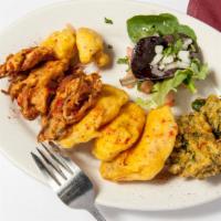 Vegetable Pakora Appetizers · Chickpea battered vegetable fritters with tangy chutney.