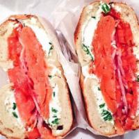Bagel With Smoked Salmon & Cream Cheese · Boiled and baked round bread roll. prepared and flavored with smoke. mild flavored fish. sof...