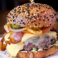 The London Burger · 6oz. beef patty, bacon, cheese, lettuce, tomato, pickles, onions and B&L's secret burger sau...