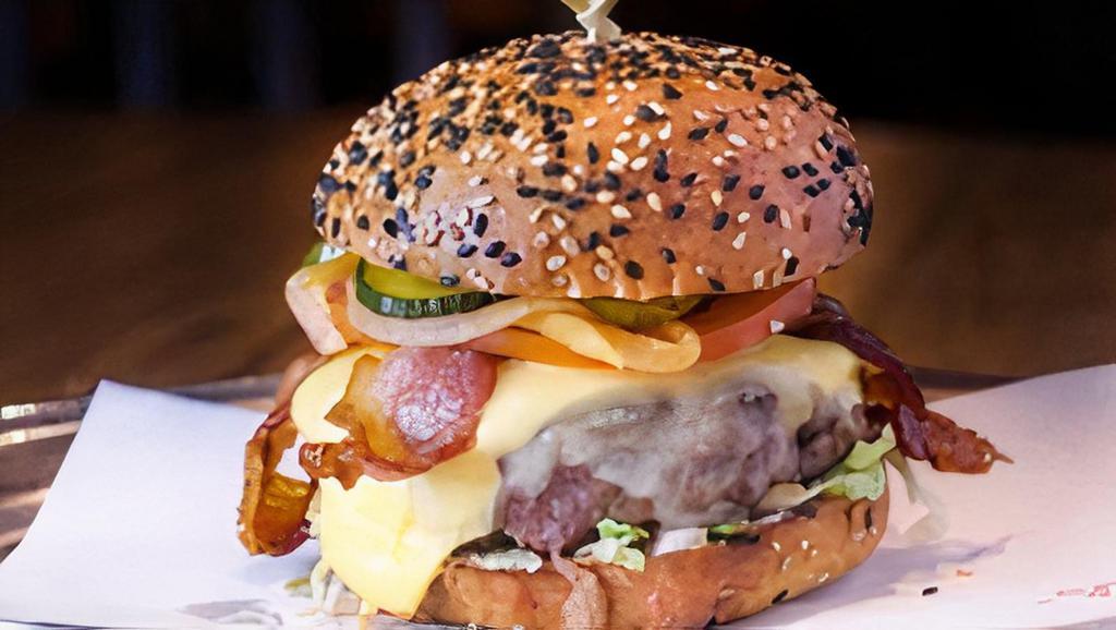 The London Burger · 6oz. beef patty, bacon, cheese, lettuce, tomato, pickles, onions and B&L's secret burger sauce.
Served with our crispy fries