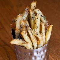 Truffle Fries · Thicker than our standard fries,  golden brown, tossed with black truffles, olive oil and sa...