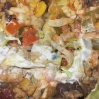 Vegetarian Chilli Burrito · Made with chilli powder, kidney beans, chickpeas.