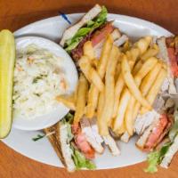 Turkey Club · Triple Decker Sandwich on White Toast with Lettuce, Tomato, Bacon & Mayo

Served with Fries
