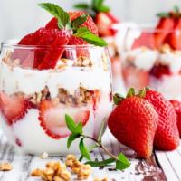 Strawberry Parfait · Thick yogurt swirled with fresh strawberries and sweet granola.